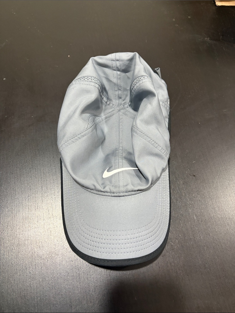 Nike Gray Performance DRI Fit hat with White Swoosh nike symbol new without tags